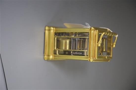 A mid 19th century French lacquered brass hour repeating carriage clock, width 3.5in. depth 3in. height 5.25in